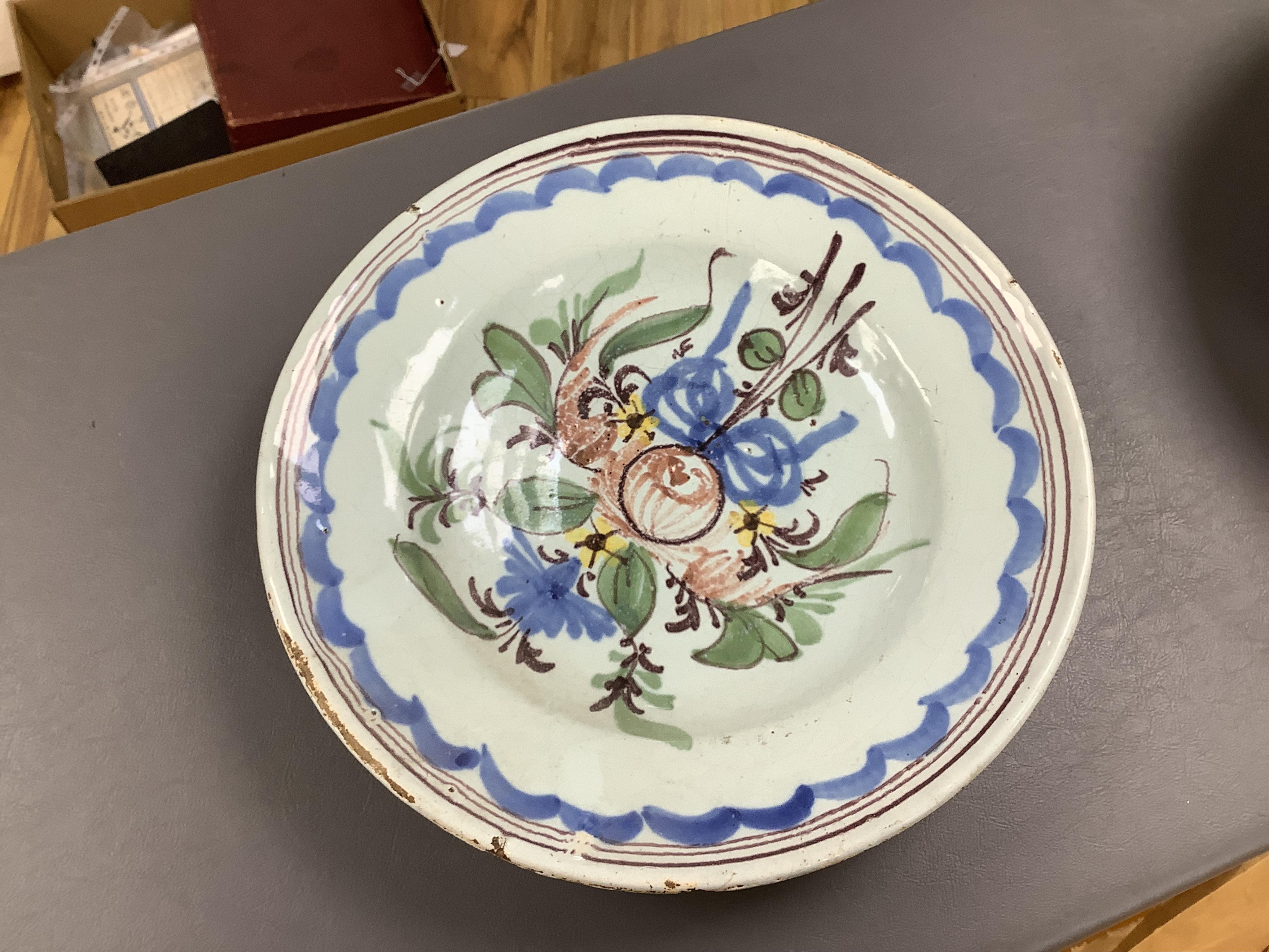 18th and 19th century faience including five chargers and large bowl, latter 30cm